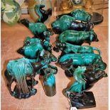 A collection of assorted Blue Mountain pottery figures, to include bison, polar bear, camel, rearing