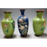 A pair of Japanese cloisonne vases of baluster form, height 23cm, together with one other