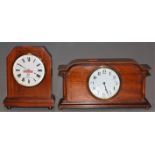 An Edwardian mahogany and boxwood strung mantel clock, having enamelled dial with Arabic numerals,
