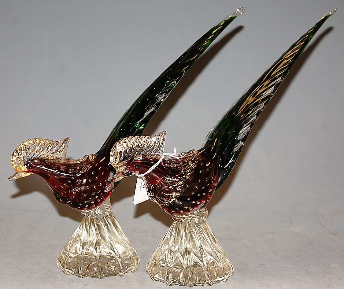 A pair of Murano glass models of pheasants, having red and green tinted bodies, with paper label