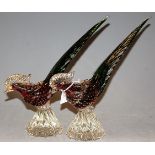 A pair of Murano glass models of pheasants, having red and green tinted bodies, with paper label