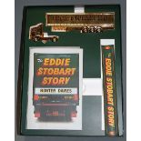A Corgi 1.64 scale model of a gold plated Eddie Stobart truck and trailer together with The Eddie