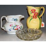 An Art Deco jug with painted floral decoration (a/f) together with one other Victorian water jug and