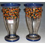 A pair of early 20th century Czechoslovakian glass vases, with hand-painted decoration (chips to
