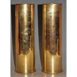 A pair of trench art brass shell cases, having stipple engraved decoration, h.28cm