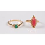 A 14ct emerald ring, size M-N, (2g) and an unmarked marquise shape coral ring, size M-N, (1.5g), (