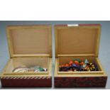 Two small jewellery boxes and a quantity of hardstone jewellery to include carnelian beads, tigers
