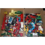 Two boxes of various loose playworn diecast vehicles to include Matchbox series, Dinky Toys,