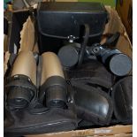 Five pairs of binoculars to include Opticron, Countryman, Praktica etc