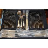 A modern cased and apparently unused 11 place setting cutlery canteen by Harmonie in stainless steel