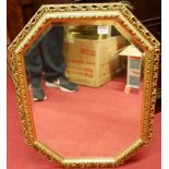 A gilt framed and bevelled octagonal wall mirror, and two other rectangular examples (3)
