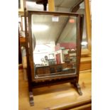 A small 19th century mahogany cushion framed swing dressing table mirror, w.30cm