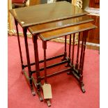 An early 20th century mahogany nest of three occasional tables, width of largest 51cm