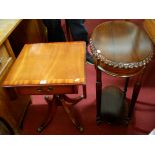 A reproduction mahogany pedestal dropflap single drawer low occasional table; together with an