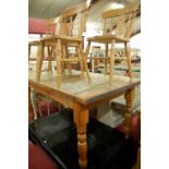 A modern pine farmhouse kitchen table, raised on turned supports, length 152cm; together with four