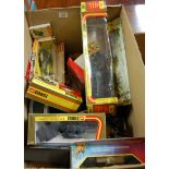 A box containing a quantity of loose and boxed military and saloon diecast models, to include a