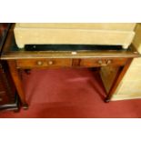 A joined oak and leather inset two drawer writing table, on square tapering supports, w.106cm