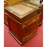 A mid-Victorian burr walnut three-quarter gallery backed slopefront davenport, having revolving