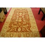 A Zieglar woollen rug, having all-over stylised floral decoration, 286 x 177cm