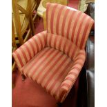 A 19th century mahogany framed and red striped floral upholstered tub armchair