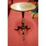 A 19th century mahogany circular fixed top pedestal tripod occasional table