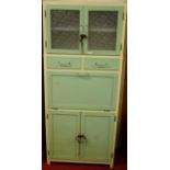 A 1950s painted kitchen cabinet, having twin frosted glazed upper doors, width 78cm