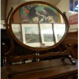 A circa 1900 mahogany and satinwood strung oval swing dressing table mirror, w.49.5cm