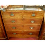 An early 19th century mahogany and satinwood strung chest, of two short over three long drawers, w.