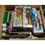 A box containing a quantity of mixed boxed and loose Matchbox Convoy Series tractor units and