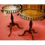 A pair of reproduction mahogany circular galleried fixed-top pedestal occasional tables, dia. 46cm