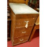 An early 20th century walnut three drawer office filing chest, having chrome handles, w.52.5cm