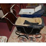 A Townsend's of Bury St Edmunds painted metal dolls pram; together with one other similar example (