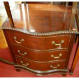 A mahogany serpentine front chest of three long drawers, having gadrooned edge, w.70cm