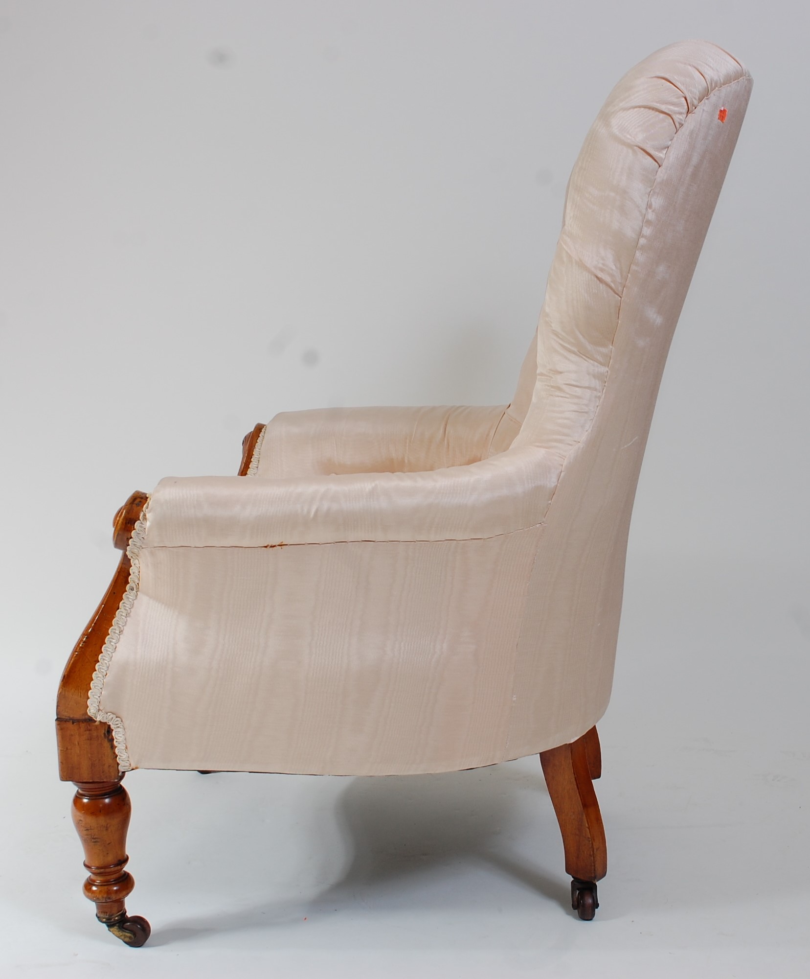 A Victorian mahogany framed spoonback armchair, the whole re-upholstered in a buttonback silk - Image 3 of 3