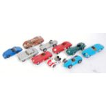 Ten various loose kit built white metal and resin 1/43 scale classic car and racing miniatures, some