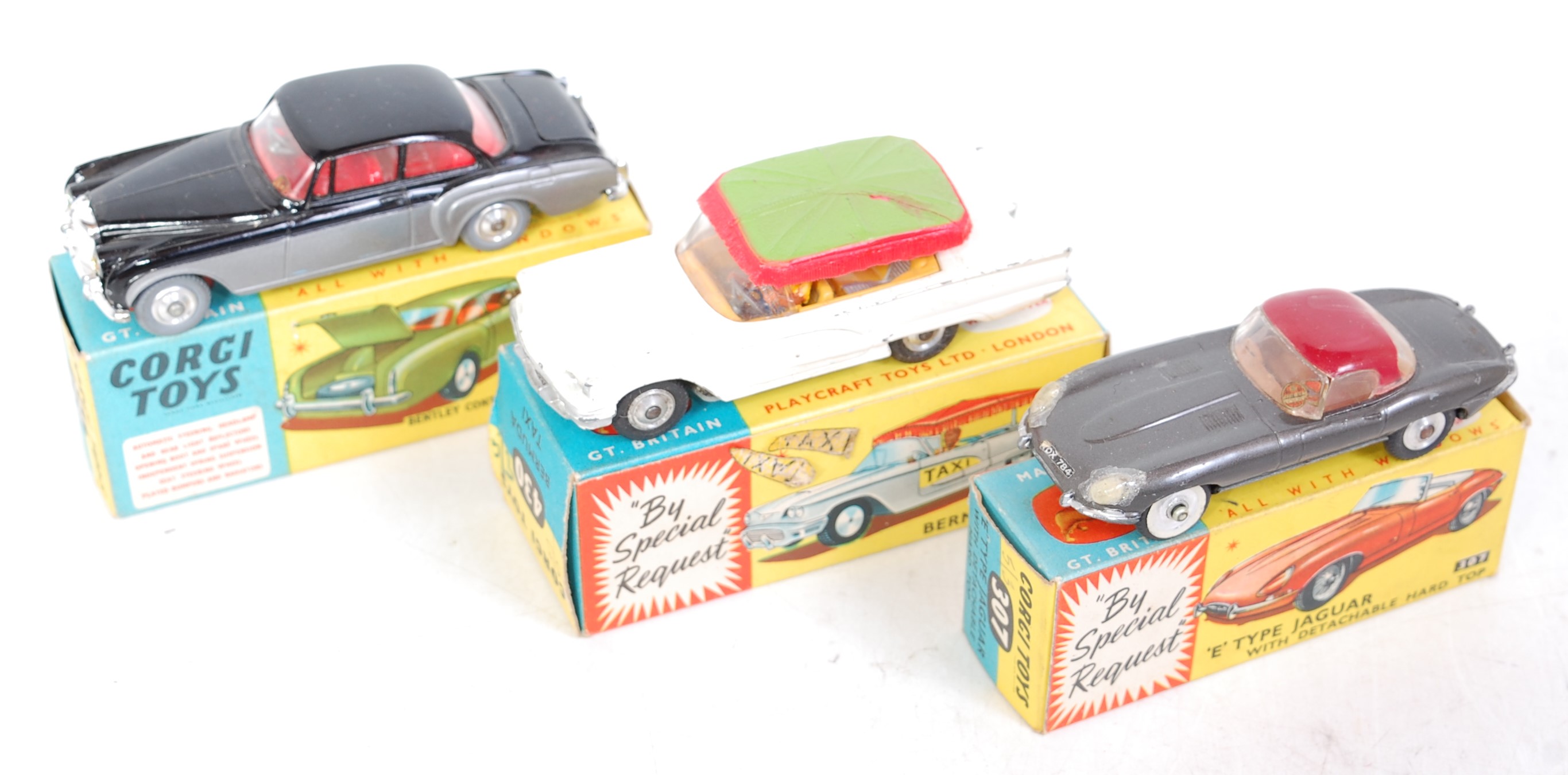 Three various boxed Corgi Toys playworn diecast to include No. 307 E-type Jaguar, No. 430 Bermuda