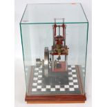 A Stuart Turner to James Combs Designs table engine finely built and finished with 7" black