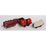 French Hornby postwar maroon SNCF 0-4-0 20v AC loco and 4 wheel tender, loco missing a buffer and