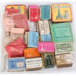 Perspex box containing an interesting assortment of Meccano France small parts ** tins and boxes. (