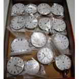 A collection of fifteen various 19th century and later pocket watch dials and movements, examples to