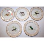 A set of eleven Limoges cabinet plates, each decorated with central bird within raised wavy