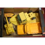 A small collection of playworn Tonka toys to include flatbed truck, dump truck etc