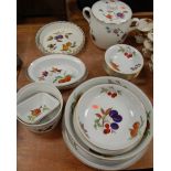 A quantity of Royal Worcester Evesham table wares to include flan dishes, bowls, biscuit jar & cover