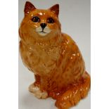 A Beswick model of a cat in seated pose impressed Beswick England verso numbered 1867, height 20cm