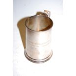 A modern silver tankard, of tapering cylindrical form, with C-scroll handle, engraved ARHW, 6.5oz