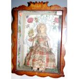 A 19th century wax head doll having beaded eyes, in a tartan dress, housed in a stained pine case,