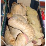 An early 20th century straw filled plush teddybear together with one other