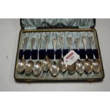 A cased set of ten late Victorian silver teaspoons, each having engraved oak leaf and acorn