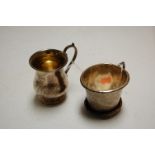 A small George V silver christening mug, of bell shape with C-scroll handle, inscribed Anne;
