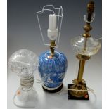 A 20th century cut glass mushroom lamp together with a blue and white table lamp base, and one other